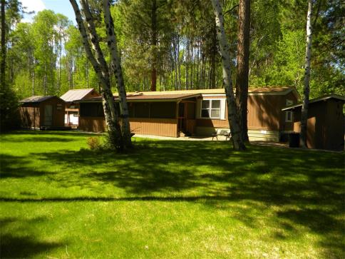2 bed and 2 bath home on .97 acre lot with established landscape